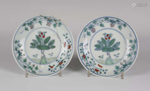 A pair of Chinese doucai porcelain circular saucer dishes, mark of Chenghua but Qing dynasty, each