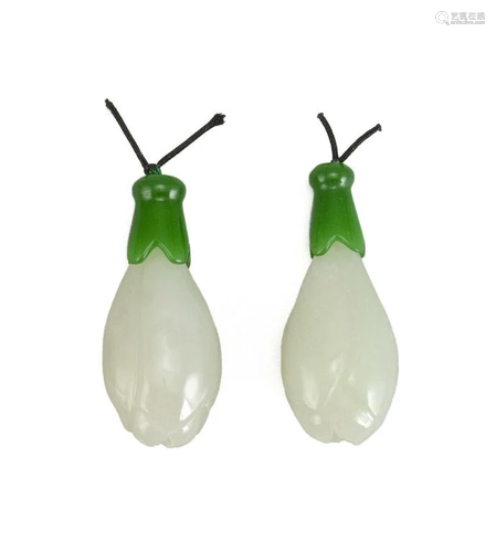 PAIR OF GREEN AND WHITE JADE PENDANTS