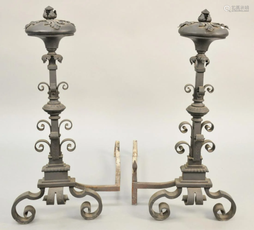 Pair of tall iron andirons. ht. 39 in. Provenance: