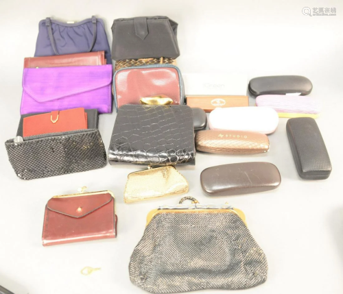 Group of purses, hand bags, and glasses to include