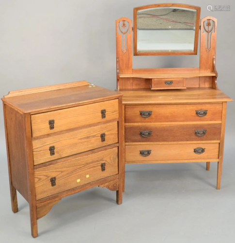 Two oak chest of drawers, one with a mirror.