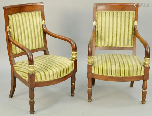 Pair of Regence Parcel Gilt Mahogany Open Armchairs,