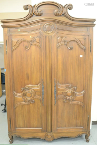 Louis XV style two door cabinet with shelved interior.