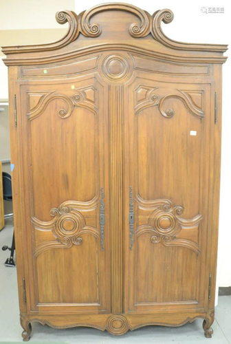 Louis XV style two door cabinet with shelved interior.