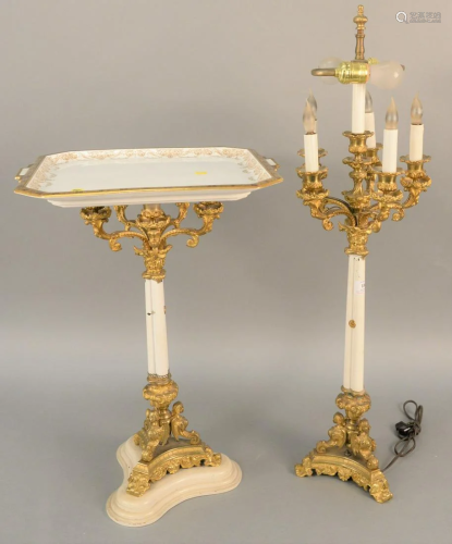 Pair of French bronze candelabras, one made into …