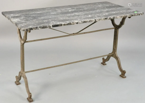 Iron base table with grey marble top. ht. 28 in., t…