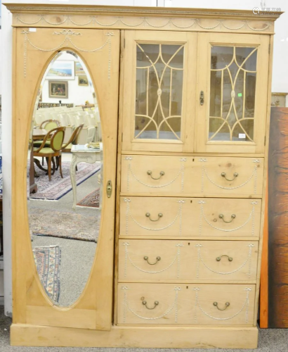 Large pine chifferobe having large door with oval