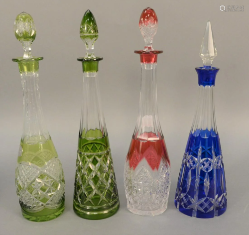 Group of four cut to clear glass decanters, two gr…