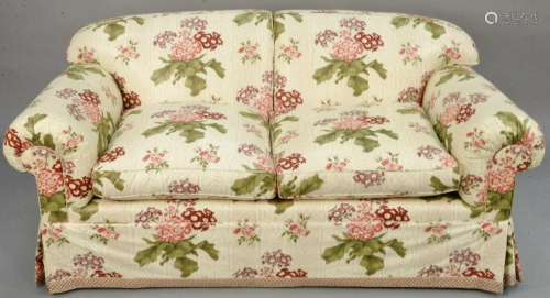 Custom upholstered loveseat with two cushions,