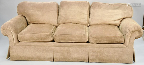 Light brown upholstered three cushion sofa. lg. 86 in.