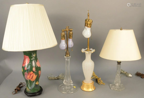 Group of four table lamps to include a pair of flo…