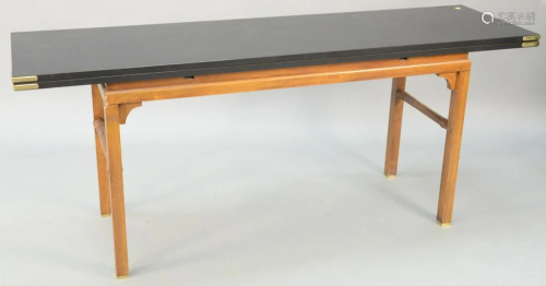 Fold over table with laminate top. open: 40