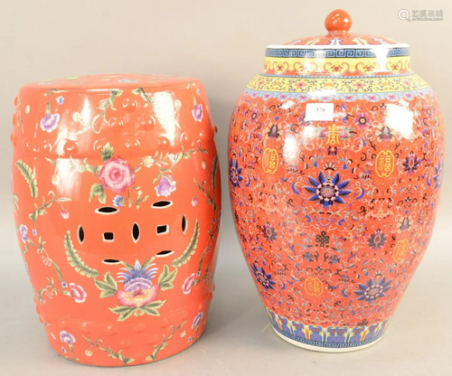 Two Oriental porcelain pieces, red garden seat and a