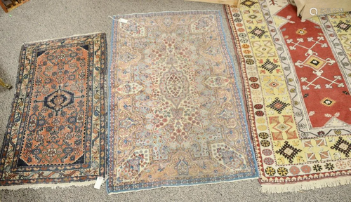 Four oriental throw rugs. 2' 3