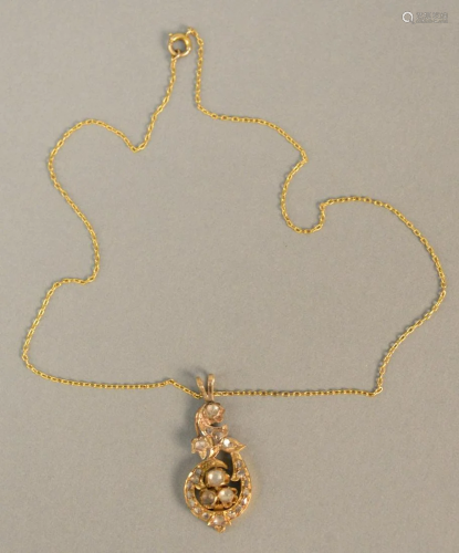 Diamond pendant set with rose cut diamonds in gold