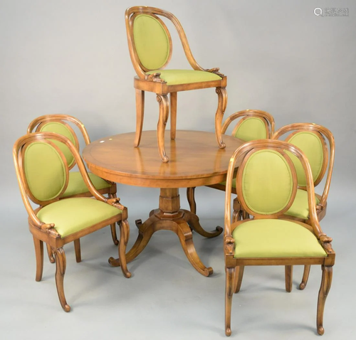 Six piece Baker dining set with round table and six