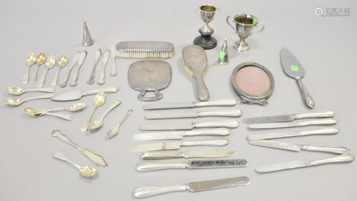 Silver lot with coin demi spoons and weighted st…