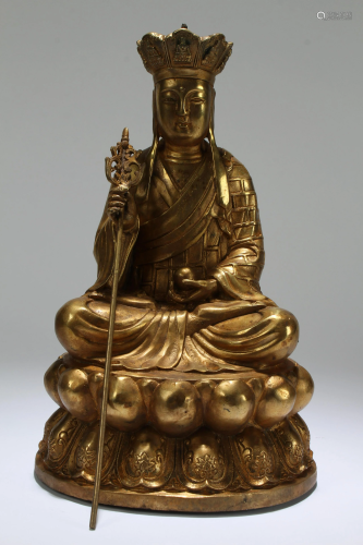 A Chinese Lotus-seated Gilt Religious Buddha Statue