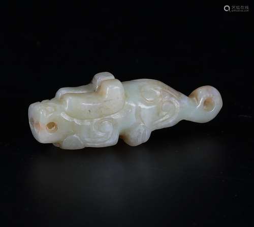 A Chinese carved jade tiger.