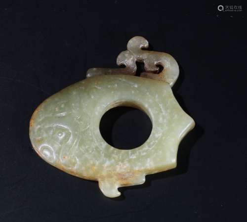 A Chinese Carved Yellow Jade Pendant.
