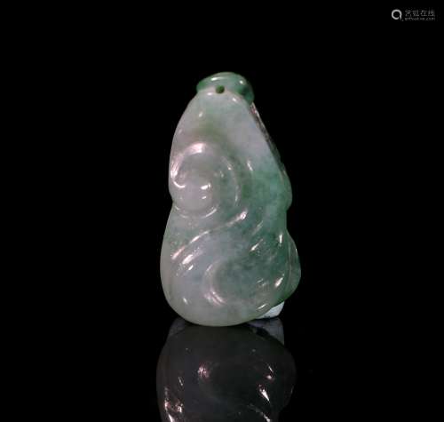 A Chinese Carved Jadeite Pendant.