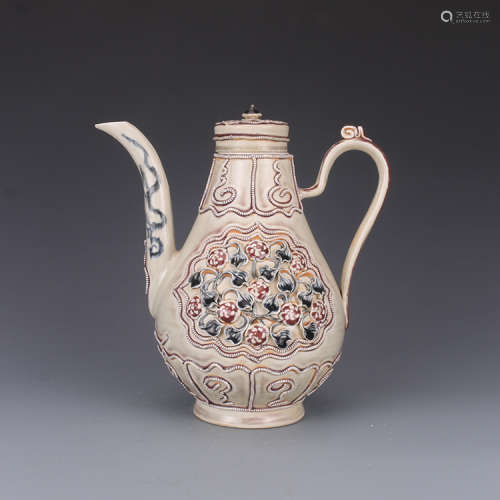 A Chinese blue and white and under glaze red porcelain ewer.