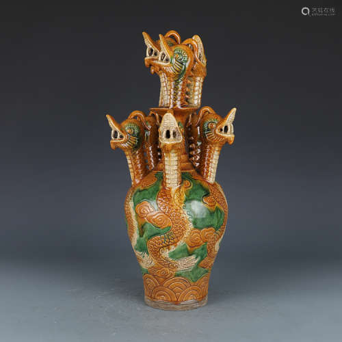 A Chinese Sancai Porcelain Vase with Dragon Head Decoration.