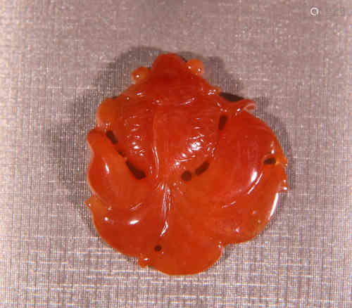 A Chinese Red Jadeite Pendant of Goldfish.