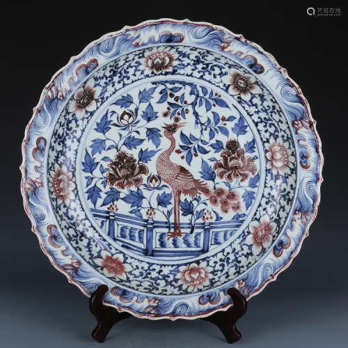 A Chinese blue and white and under glazed red porcelain charger.