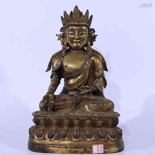 A Chinese Gilt Bronze Statue of a Buddha.