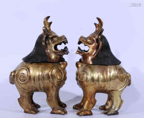 A Pair of Chinese Gilt Bronze Figures.