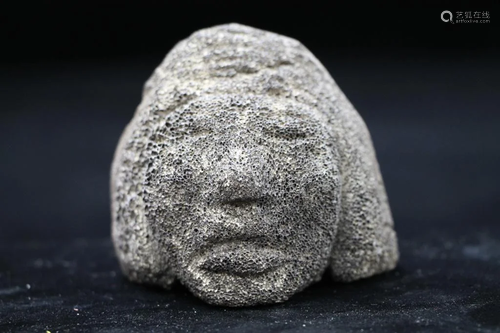 Stone Carved Woman's Head