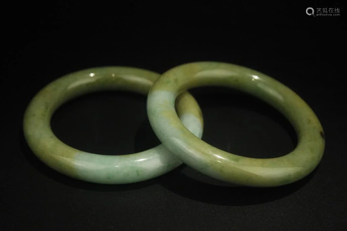 A Pair of Jade Carved Bangles