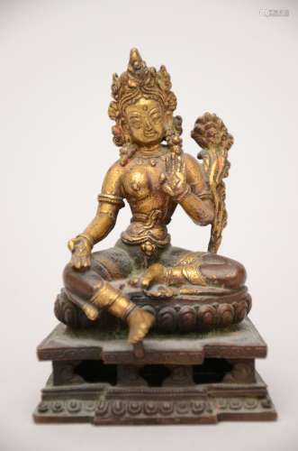 A bronze sculpture 'green tara', Tibet or Nepal (10cm)