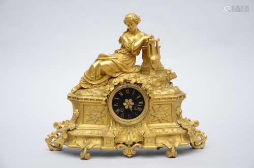 A gilt clock in bronze and zamack 'lady' (50x40cm)
