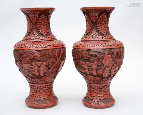 A pair of Chinese vases in red lacquer 'landscapes' (38cm)