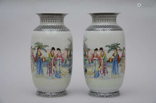 A pair of vases in Chinese porcelain 'elegant company', marked (41cm)