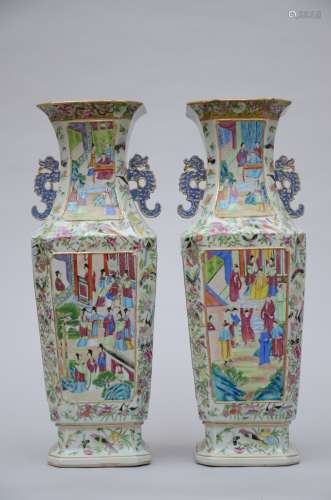 A pair of Chinese octagonal vases in Canton porcelain 'court scenes' (*) (61cm)