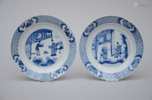 A pair of plates in Chinese blue and white porcelain 'sages in an interior', Kangxi mark and period