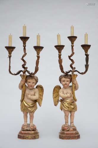 Pair of wooden candlelights 'putti', 20th century (88cm)
