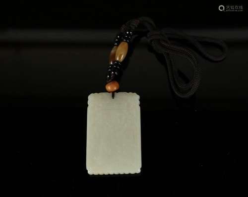 A WHITE JADE PENDANT QING