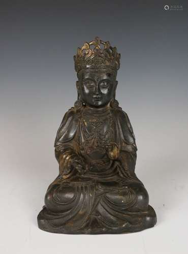 A BRONZE GUANYIN FIGURE MING