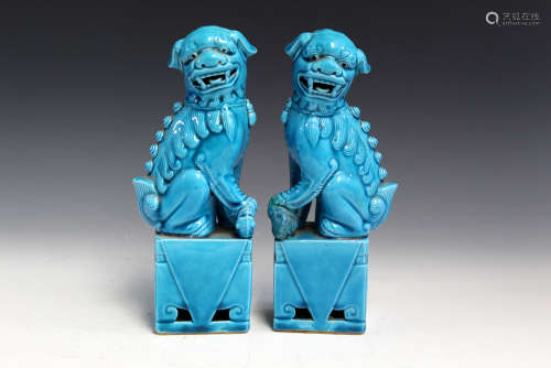 A Pair of Chinese Blue Glazed Porcelain Foo Dogs.
