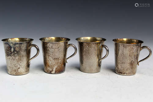 Four Chinese silver cups.