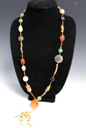 Chinese gem stone necklace with agate pendant.