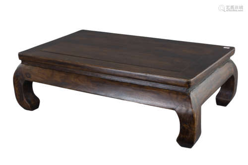 A Chinese 18/19th century rectangular hardwood Kang table (Kangzhou) with thick curved legs. Possibl