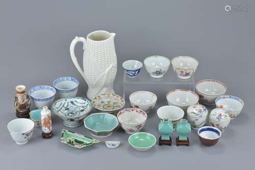 A large quantity mainly Chinese porcelain 18/19th century tea cups and miniature vases with other po