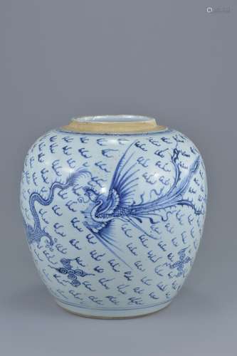 A large Chinese 18th century blue and white porcelain dragon and phoenix jar. 23cm height.