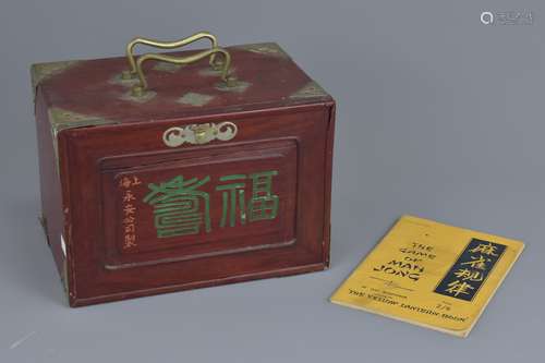 A Chinese early 20th century complete 144 piece Mahjong set in wooden travel box from the Wing On De