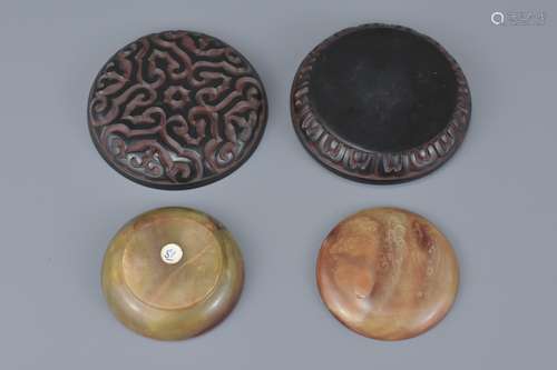 Two Chinese Seal Boxes and Covers, one Agate example, 5.5cms diameter and one Lacquered example, 8cm